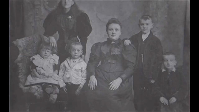 Photo of Mary Sharp's family with mother and children.