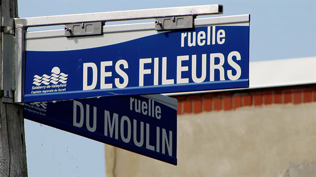 Street signs for the Ruelle des Fileurs and Rue du Moulin.